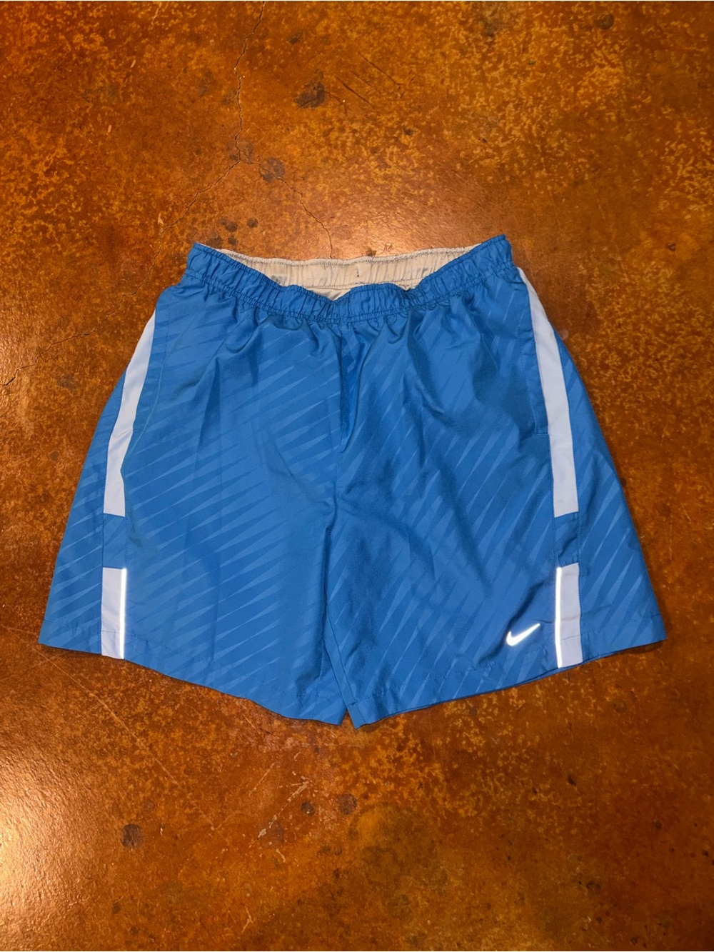 Nike Men's Blue Athletic Running Shorts with White Accents